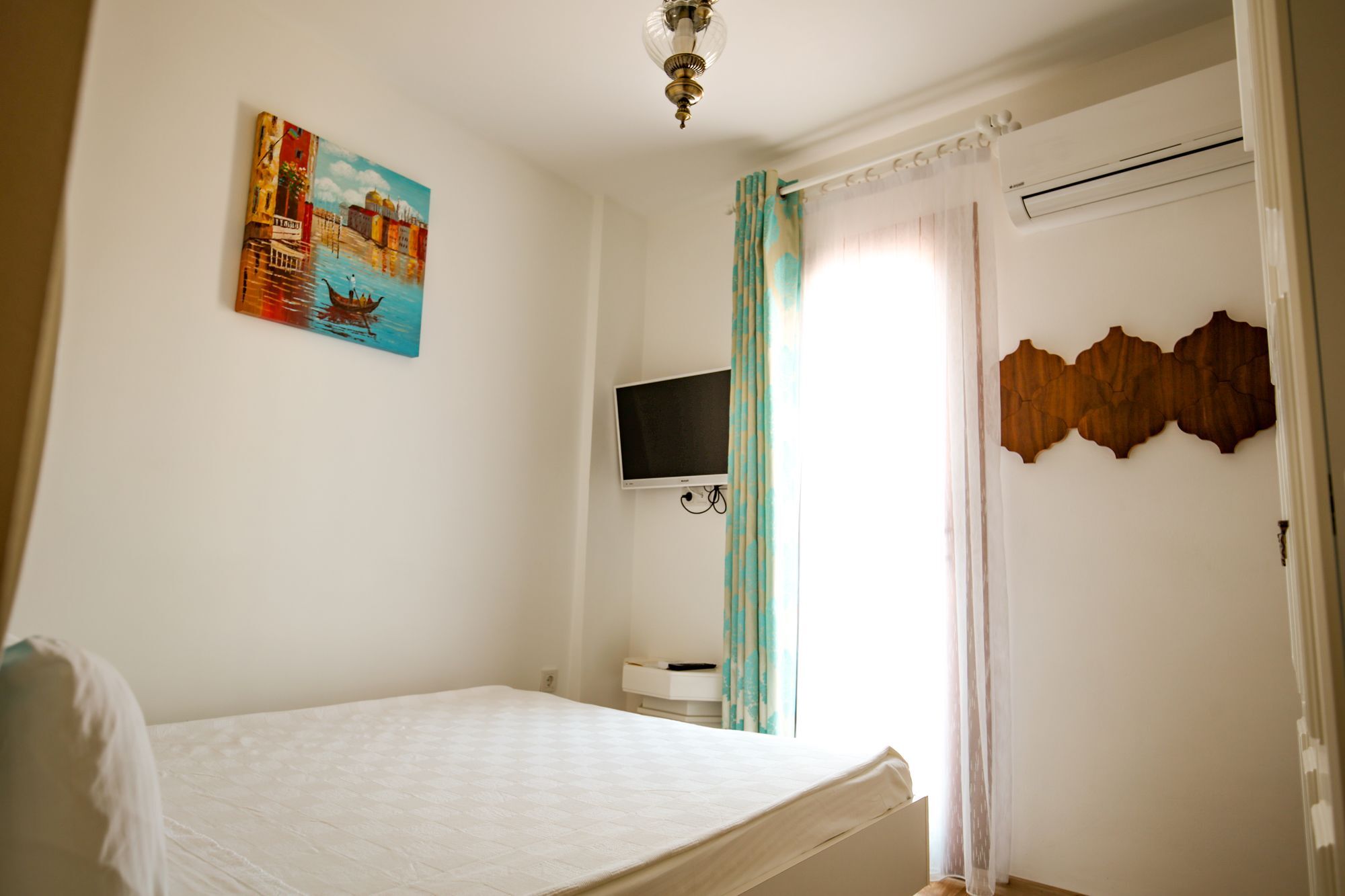Menendi Otel Foça Bagian luar foto